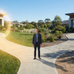 Man at a fork in a path. Left path is bright, smooth, leading to a glowing house. Right path is winding, maze-like, leading to another house, symbolizing choices.